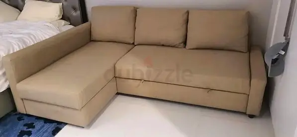 IKEA L shap Sofa store cum bed you can fix the storage lift or Right any side