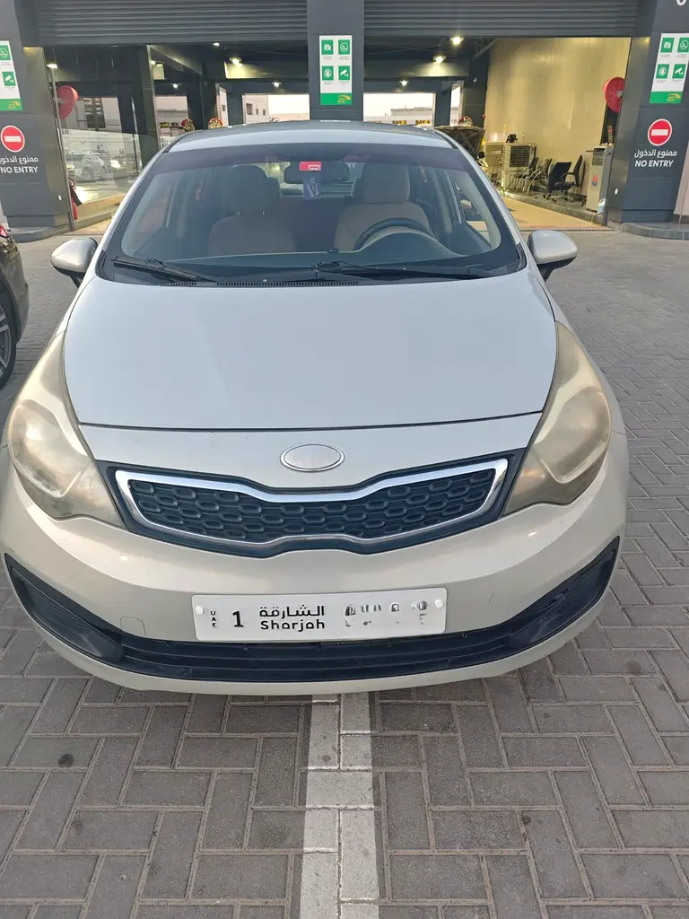Kia Rio 2014 — photo 1 of 7