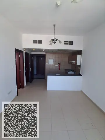 One-bedroom apartment for annual rent in City Towers, Ajman, with an open view of Sheikh Khalifa Street.