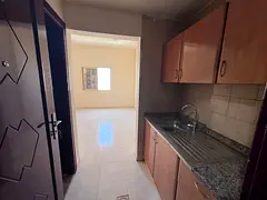 Al Rashidiya 2 Semi-detached kitchen - Large space and practical layout - Central air conditioning a