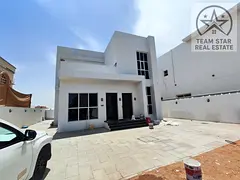 Villa for rent in Al RAWDA area, consisting of five master bedrooms, a majlis, a living room, and a