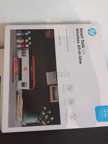 Printer for sale, good condition looks very good and one black ink bottle included