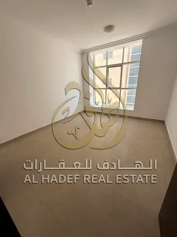 Live Directly on Al Wahda Street! Spacious 2BR with "3-Month Deferred Security Cheque" & Easy Parking!