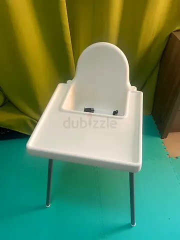 IKEA white baby high chair with tray and straps