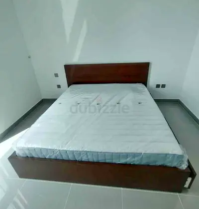 IKEA malam king‑size bed (180 × 200 cm) with 2 storage drawers and an IKEA mattress