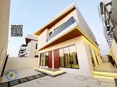For sale in Al Helio area, 2 villas, 5BR with roof, Registration fees, modern finishing, large areas