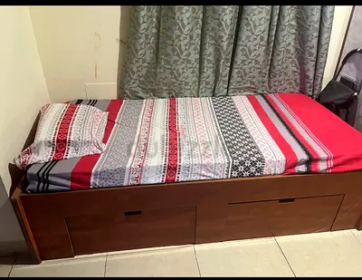 Single wooden bed with underbed storage - good condition