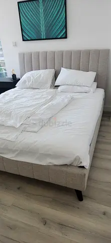 Upholstered Queen Bed Frame with Padded Headboard - Beige
