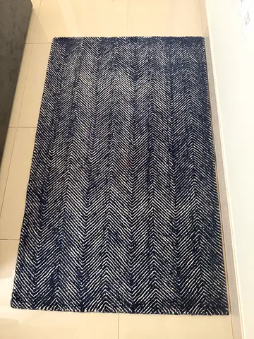 Pottery Barn pure wool rug. Only 1.5 years old, used sparingly in guest room
