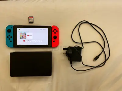 Nintendo Switch V2 + Super Smash Bros Ultimate - Flawless Condition