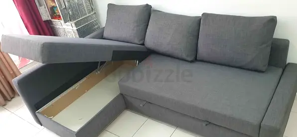 Ikea L shape sofa store cum bed and you can fix the storage lift or right