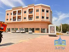 A new residential-commercial building, first occupant, for sale.