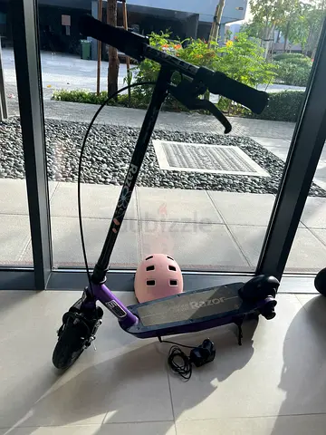 Razor Electric Scooter with Charger and Helmet - Good Condition