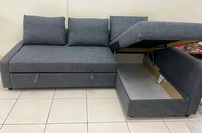 Ikea L shape sofa store cum bed and you can fix the storage lift or right anyside you want is availa