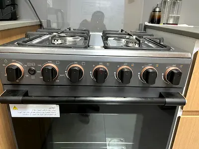 Used Stainless Steel 4-Burner Gas Range with Oven - Good Condition