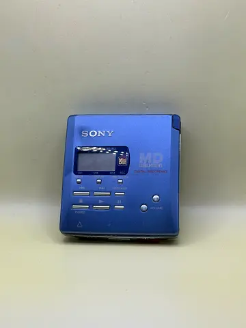 vintage Sony MZ-R55 portable MiniDisc player and recorder in blue.
