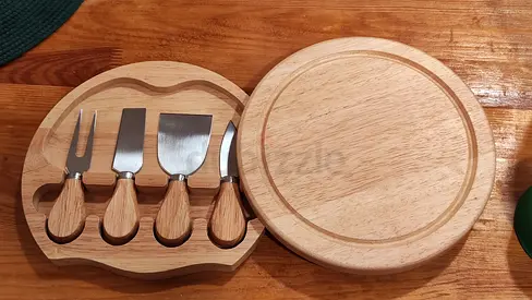 cheese serving board with knives