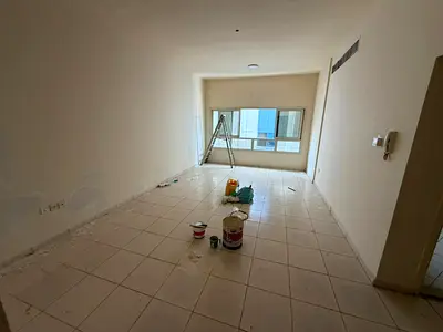 Spacious studio with separate kitchen, balcony, excellent view, central air conditioning, prime location in Al Bustan, next to Lulu Hypermarket and bu
