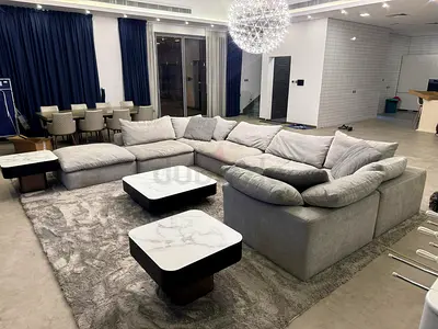 Gary Pan Emirates pianca feather filled sofa with footstool