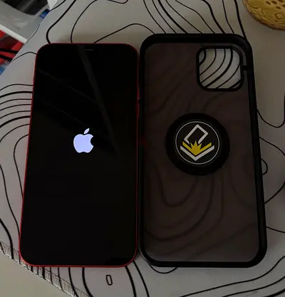 iPhone 12 in Red with Protective Case - Good Working Condition, Spotless
