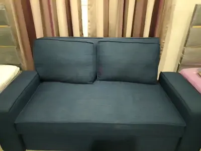 Compact 2-Seater Blue Sofa cum bed in Good Condition