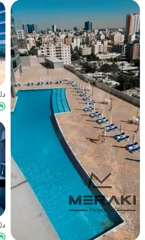 Great opportunity to own a spacious studio apartment in Corniche Residence Towers, Ajman, offering a smart layout divided into a living room and bedro