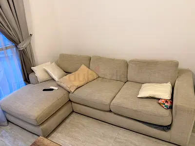 Light grey L-shaped 3-seater sofa — good condition