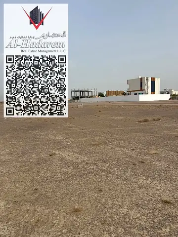 Corner plot for sale in Al Manama 11.