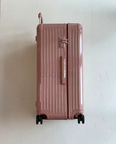 Rimowa Especially trunk plus suitcase in a glossy desert rose Pink