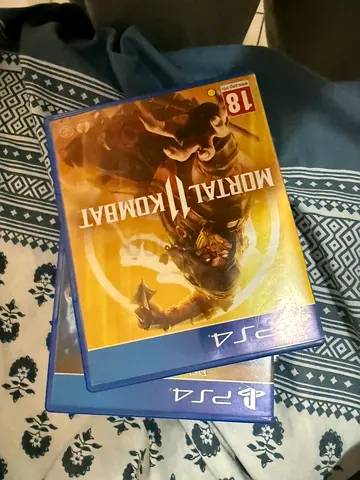 Two PS4 Mortal Kombat Game Discs (Mortal Kombat X and Mortal Kombat 11) - Good Condition