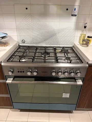 Used stainless steel gas cooker with oven - good condition. 5 gas cooker