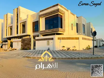 Corner villa for sale in Al Helio 2, Ajman, with a spacious building area and five bedrooms, includ
