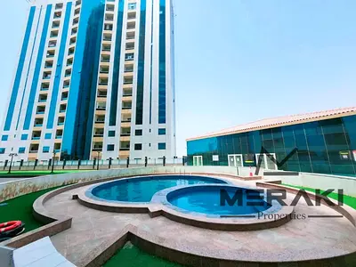 استوديو للايجار السنوي بابراج الاورينت عجمان  اطلاله مفتوحه مع باركن