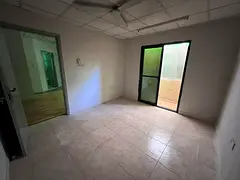 One-bedroom apartment with a living room, ground floor, and balcony, in Al Rashidiya 2 area, Al Min