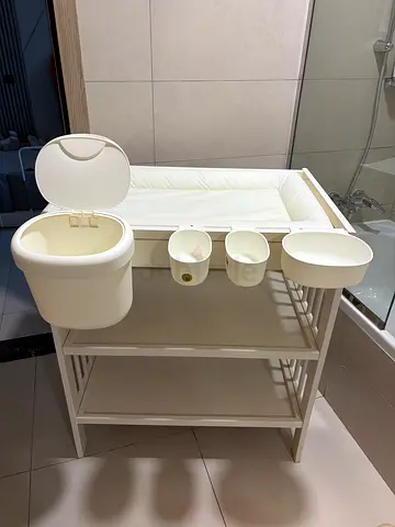 IKEA white baby changing table with diaper bins and organizers - good condition