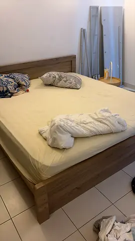 Ikea Wooden queen-size bed frame with headboard —