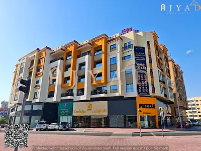 For annual rent: large shop with mezzanine in Al Mowaihat 3 Ajman, Academy Street, prime commercial location, good foot traffic, close to services