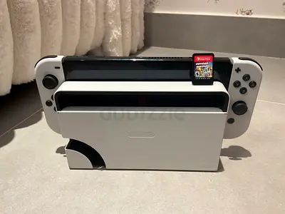 Nintendo Switch OLED (White) with game cartridge Included overcooked 1 and 2  URGENT SALE