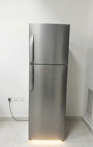 Stainless Steel Top-Freezer Refrigerator - Good Condition