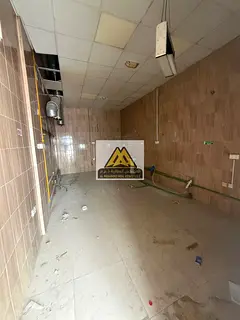 Commercial Shop for Rent on Sheikh Ammar Main Road in Al Rawda 3, Ajman – Prime Location with Spac