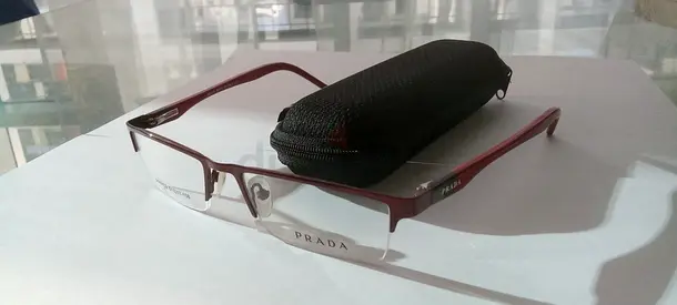 Prada semi-rimless eyeglass frames with case - maroon