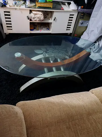 Glass Top Coffee Table with Curved Wooden Accent