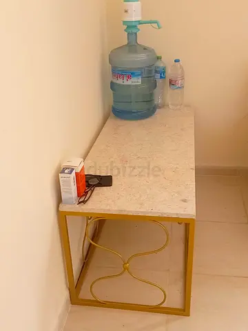 Slim gold-framed marble-top console table — good condition