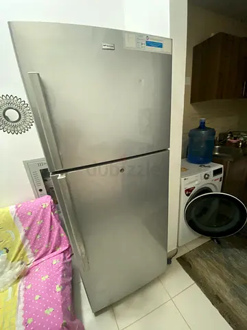 Used Silver Double-Door Refrigerator - Good Working Condition