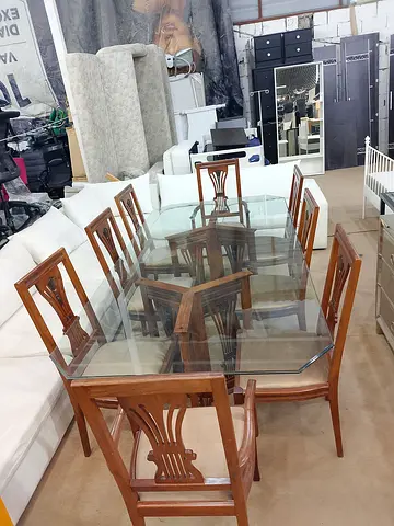 One table with glass and 8 chairs for sale