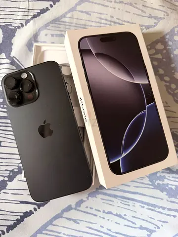 iPhone 16 Pro Max - Space Black, boxed with accessories