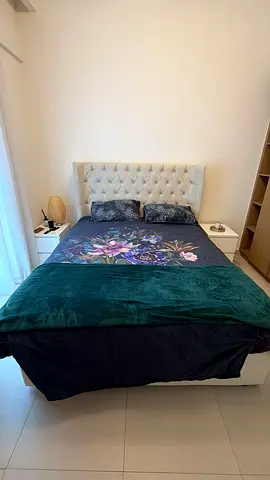 Queen tufted upholstered bed with headboard — good condition