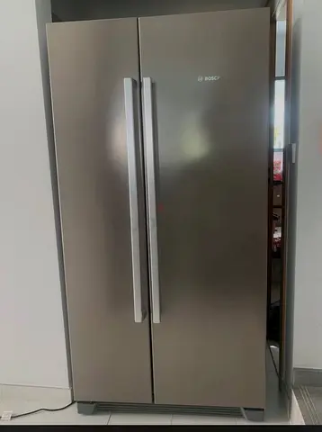 Bosch side by side refrigerator, neat and clean , same like a new