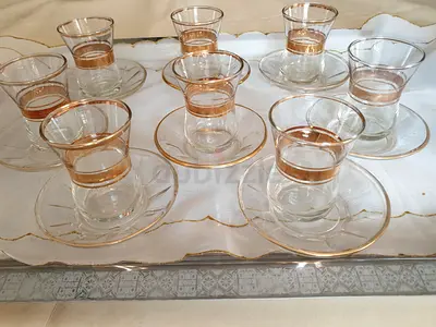 Set of 8 Turkish tea glasses with saucers - clear glass with gold rim, Almost New