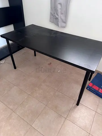 Desk with adjustable legs